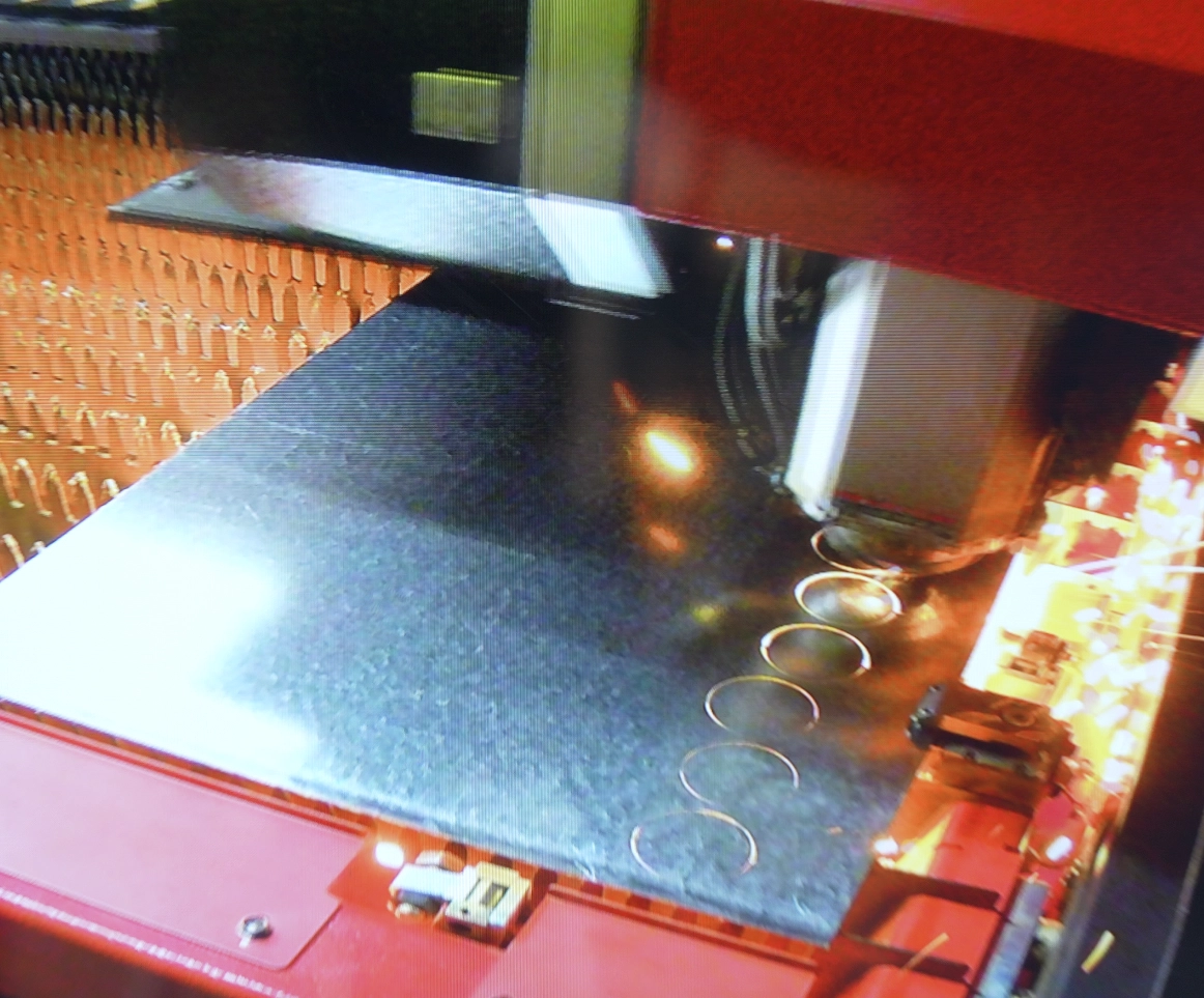 About Us 5 laser cutting in progress
